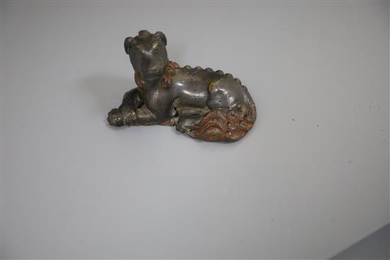 A Chinese bronze mythical beast scroll weight, 17th / 18th century, L.7.2cm